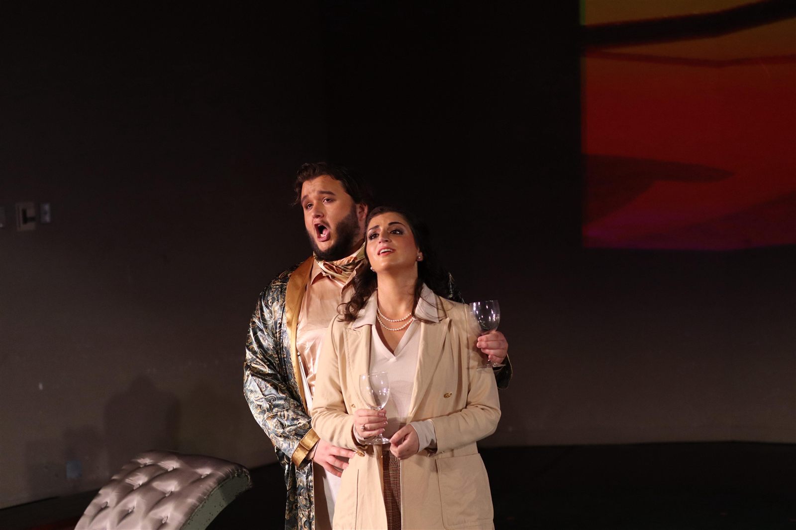 Rhys Stermer in costume on stage.